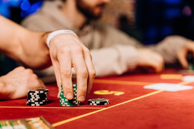 Close-up of live dealer with Lightning Roulette wheel showing strike indicators